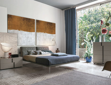 16 - Letto in legno con cuscini sfoderabili